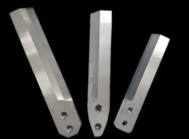 Three composite pelletizer knives with cermet working areas